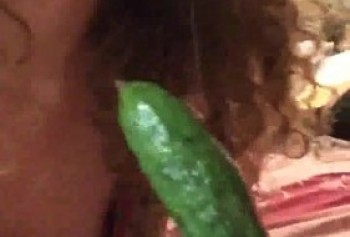 Ukrainian student learns to blowjob on a cucumber